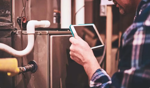 technician working on furnace
